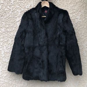 Rabbit Fur coat, pockets w/ invisible clasps.